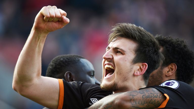Harry Maguire celebrates his equaliser against Stoke City