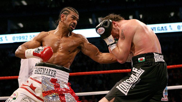 LONDON, ENGLAND - MARCH 9:   David Haye (L) exchanges punches with Enzo Maccarinelli during the Unified World Cruiserweight title at the O2 Arena March 9, 