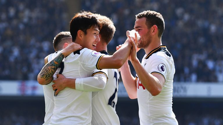 Heung-Min Son of Tottenham celebrates scoring his side's fourth goal with his Spurs team-mates during the Premier League clash v Watford