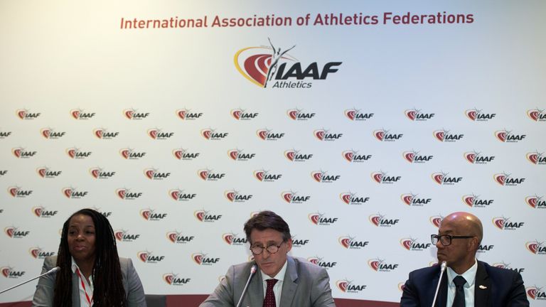 International Association of Athletics Federations (IAAF) President Sebastian Coe (C), along with former US athlete and President of the US Track and Field