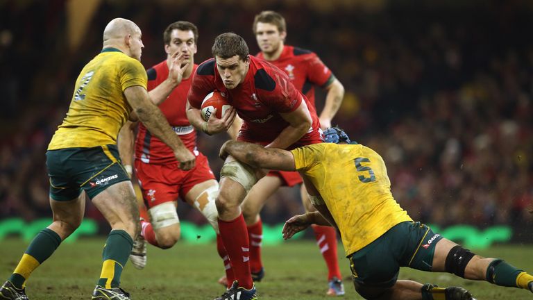 Ian Evans (C) helped Wales win the Six Nations Grand Slam in 2008 and 2012