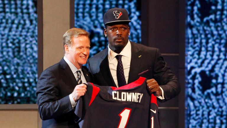 NEW YORK, NY - MAY 08:  Jadeveon Clowney of the South Carolina Gamecocks stands on stage with NFL Commissioner Roger Goodell after he was picked #1 overall