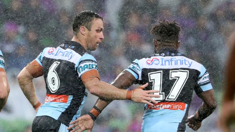 James Maloney of the Sharks is congratulated by James Segeyaro of the Sharks 