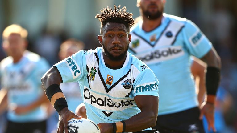 SYDNEY, AUSTRALIA - APRIL 01:  James Segeyaro of the Sharks is tackled during the round five NRL match between the Cronulla Sharks and the Newcastle Knight