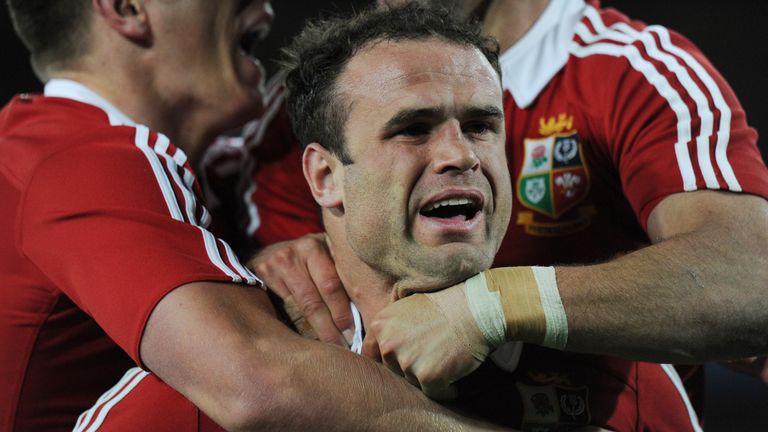 Jamie Roberts from the British and Irish Lions (C) is congratulated after scoring a try against Australia during the third and final rugby union Test in Sy
