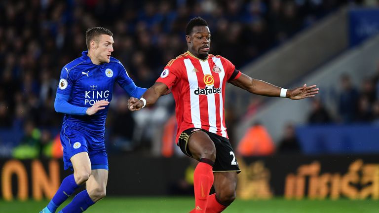 LEICESTER, ENGLAND - APRIL 04:  Jamie Vardy of Leicester City (L) and Lamine Kone of Sunderland (R) battle for possession during the Premier League match b