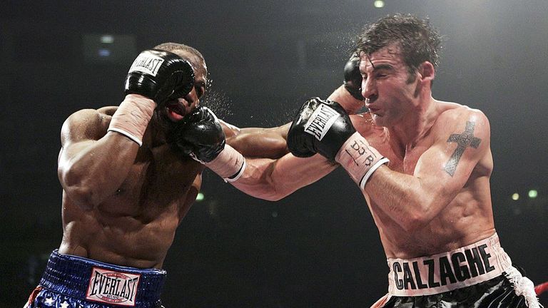  Joe Calzaghe connects with a right hook with Jeff Lacy during the WBO and IBF super middleweight unification title fight