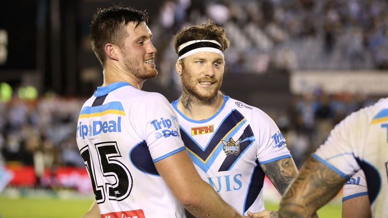 SYDNEY, AUSTRALIA - APRIL 22: Joe Greenwood and Chris McQueen of the Titans celebrate victory during the round eight NRL match between the Cronulla Sharks 