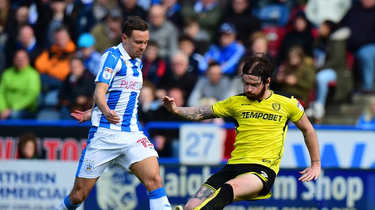 John Brayford (R) is being assessed by Burton Albion