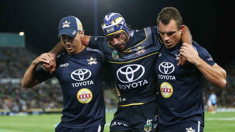 TOWNSVILLE, AUSTRALIA - APRIL 08:  Johnathan Thurston of the Cowboys is helped from the field during the round six NRL match between the North Queensland C