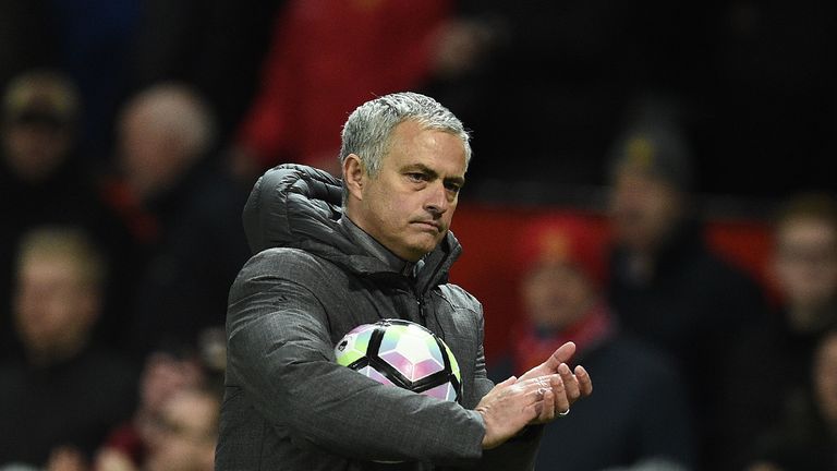 Manchester United's Portuguese manager Jose Mourinho applauds the fans following the English Premier League football match between Manchester United and Ev