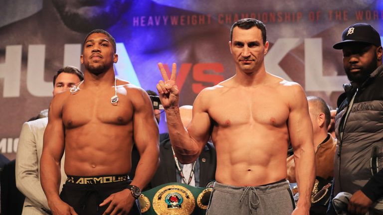 Anthony Joshua and Wladimir Klitschko pose during the weigh-in prior to the Heavyweight Championship contest at Wembley Arena 