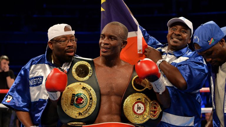 IBF/IBO Super-Lightweight World Champion Julius Indongo celebrates after beating WBA Super-Lightweight World Champion Ricky Burns