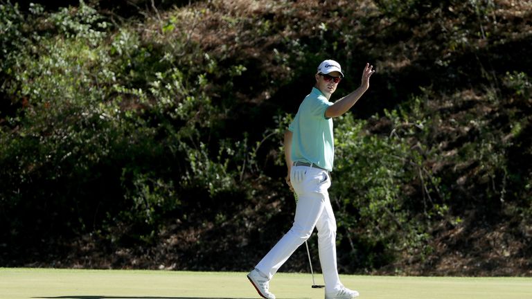 Justin Rose of England celebrates a birdie on the 12th hole during the third round of the 2017 Masters Tournament at Augusta National