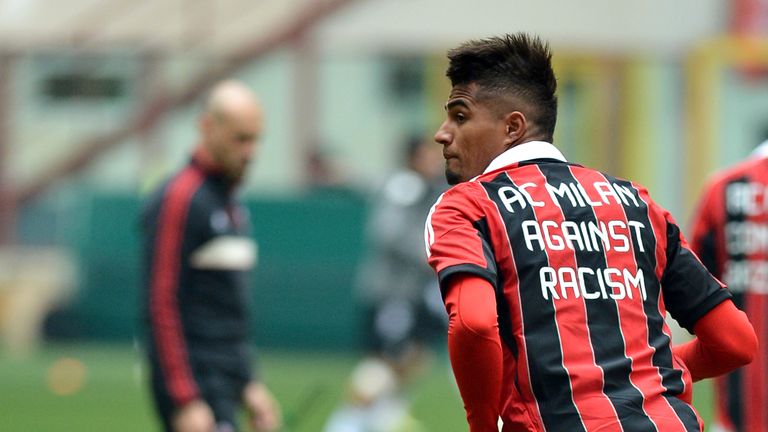 AC Milan's Ghanaian defender Prince Kevin Boateng (C) warms up, wearing a jersey against the racism prior to the Italian Serie A football match between AC 