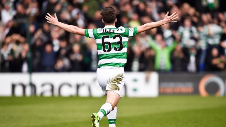 Celtic's Kieran Tierney celebrates scoring the opening goal in Dingwall