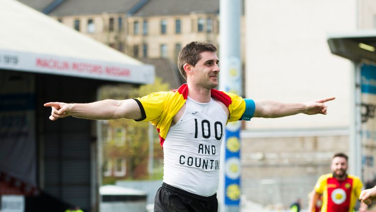 Partick's Kris Doolan celebrates after he scores his side's first goal and hits his 100 goal mark against Ross County