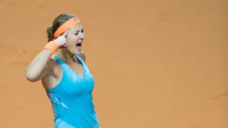 France's Kristina Mladenovic reacts after she defeated Russia's Maria Sharapova in the semi-final match at the WTA Tennis Grand Prix in Stuttgart, southwes