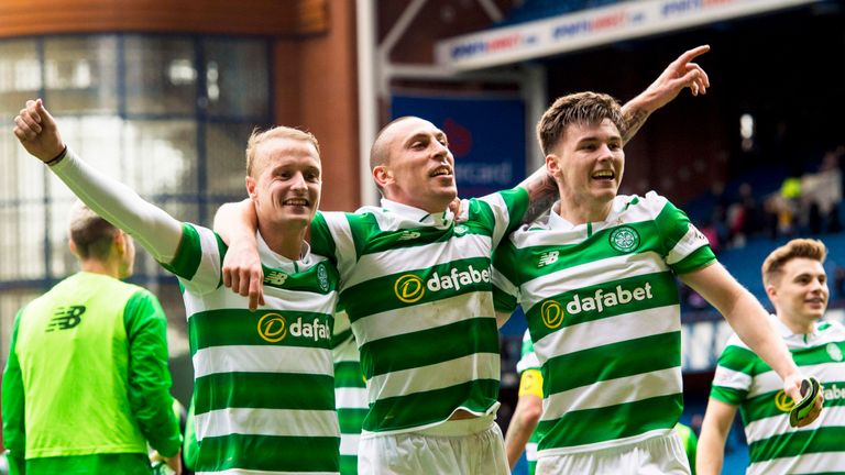 Leigh Griffiths and Kieran Tierney celebrate with Scott Brown at full time