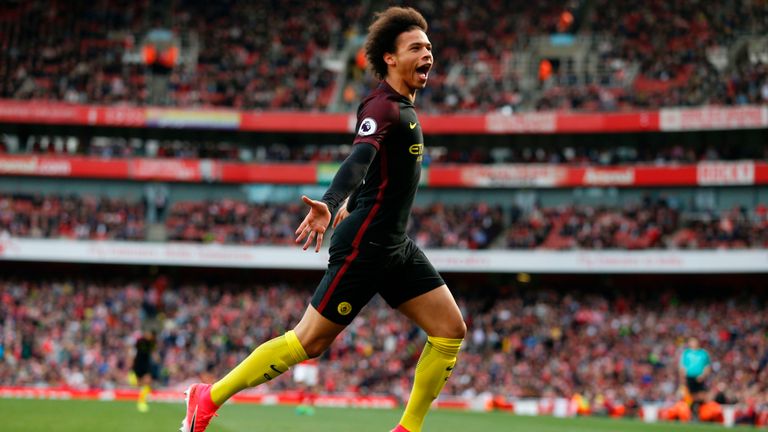Manchester City's German midfielder Leroy Sane celebrates after scoring the opening goal of the English Premier League football match between Arsenal and M