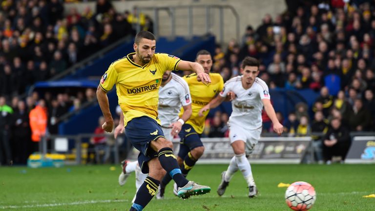 OXFORD, ENGLAND - JANUARY 10:  Liam Sercombe of Oxford United scores from the penalty spot to level the scores at 1-1 during The Emirates FA Cup third roun