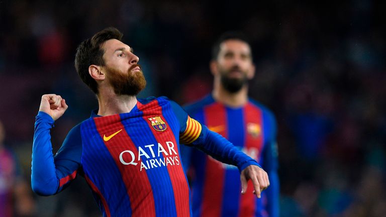 Barcelona's Argentinian forward Lionel Messi celebrates after scoring a goal during the Spanish league football match FC Barcelona vs CA Osasuna at the Cam