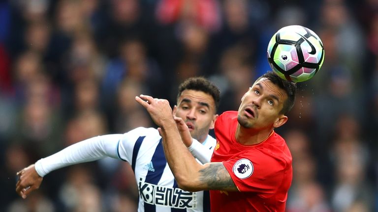 Hal Robson-Kanu of West Bromwich Albion and Dejan Lovren of Liverpool battle for possession