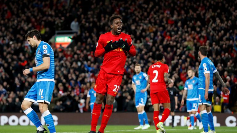 Divock Origi celebrates after his goal gives Liverpool a 2-1 lead at Anfield