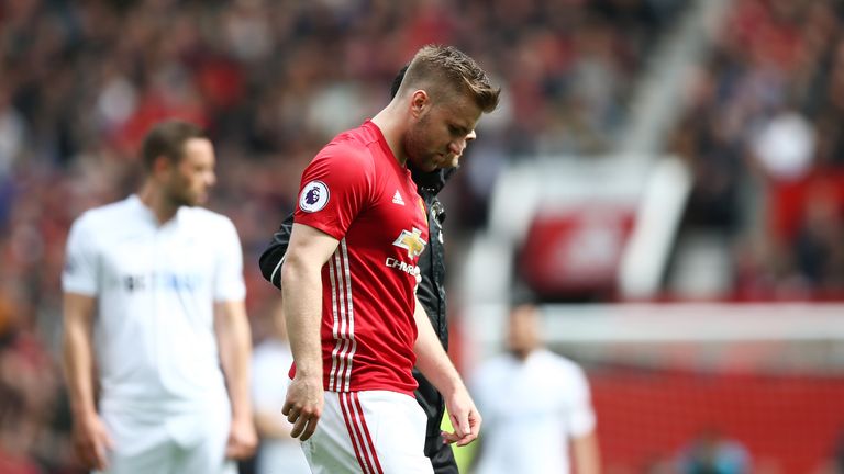 MANCHESTER, ENGLAND - APRIL 30: Luke Shaw of Manchester United looks dejected as he is forced off with a injury during the Premier League match between Man