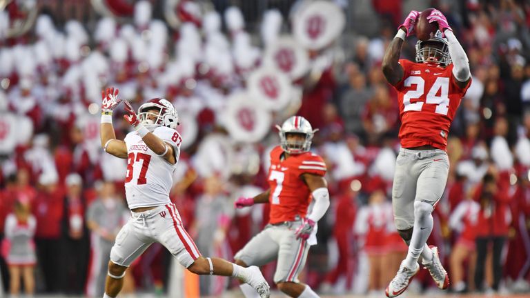 COLUMBUS, OH - OCTOBER 8:  Malik Hooker #24 of the Ohio State Buckeyes intercepts a pass intended for Mitchell Paige #87 of the Indiana Hoosiers in the fou