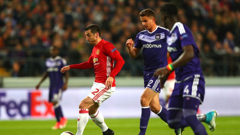 Henrikh Mkhitaryan runs at the Anderlecht defence