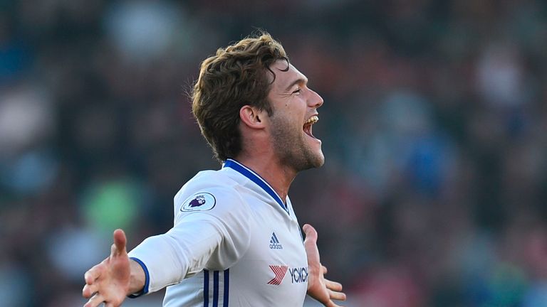 Marcos Alonso celebrates scoring Chelsea's third goal from a free kick