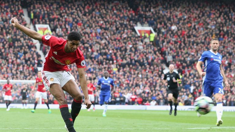 Marcus Rashford scores the opening goal during the Premier League match between Manchester United and Chelsea at Old Trafford