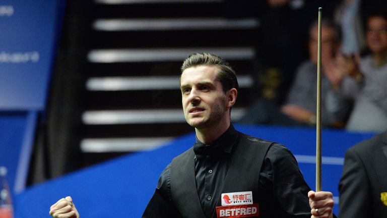 Mark Selby celebrates winning