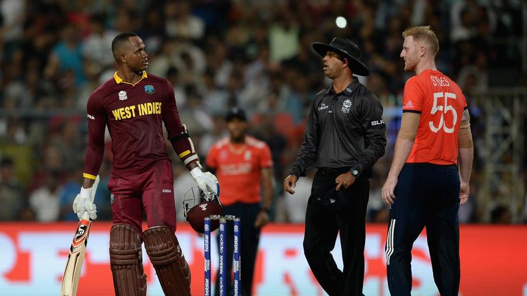 Marlon Samuels of the West Indies and Ben Stokes of England exchange words