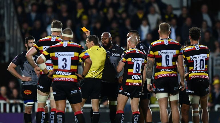 Mathieu Tanguy of La Rochelle is shown a yellow card by referee Andrew Brace