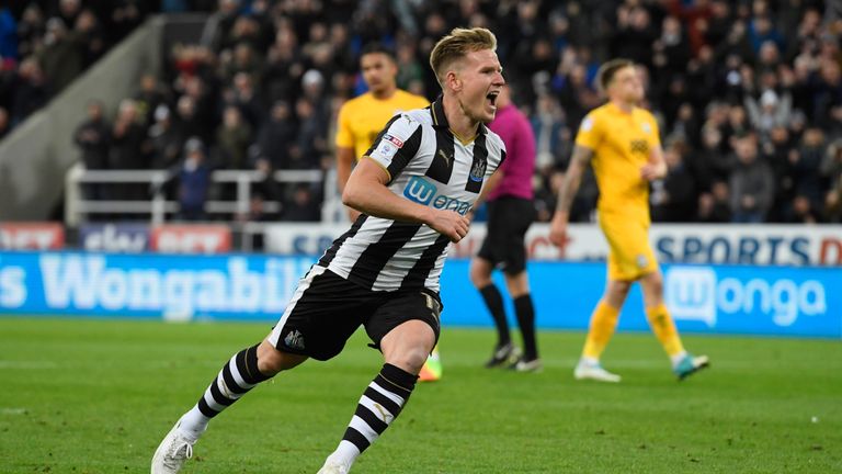 Matt Ritchie of Newcastle United celebrates as he scores their third goal from a penalty against Preston