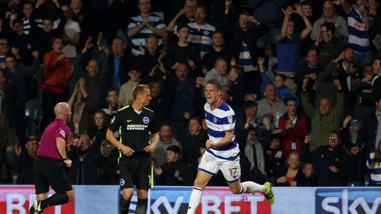 Queens Park Rangers' Matt Smith (right) celebrates scoring his side's first goal of the game during the Sky Bet Championship match at Loftus Road, London.