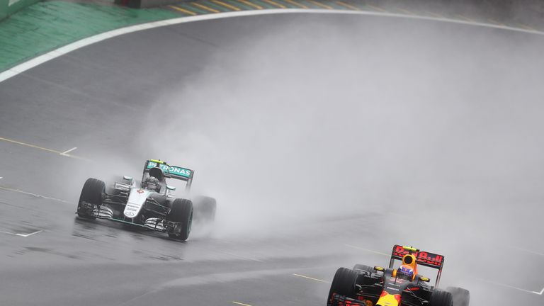 SAO PAULO, BRAZIL - NOVEMBER 13:  Max Verstappen of the Netherlands driving the (33) Red Bull Racing Red Bull-TAG Heuer RB12 TAG Heuer overtakes Nico Rosbe