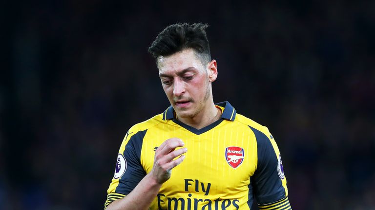 Mesut Ozil looks dejected during the 3-0 defeat to Crystal Palace at Selhurst Park
