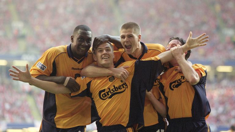 Michael Owen (centre left) scored twice to secure the 2001 FA Cup final against Arsenal