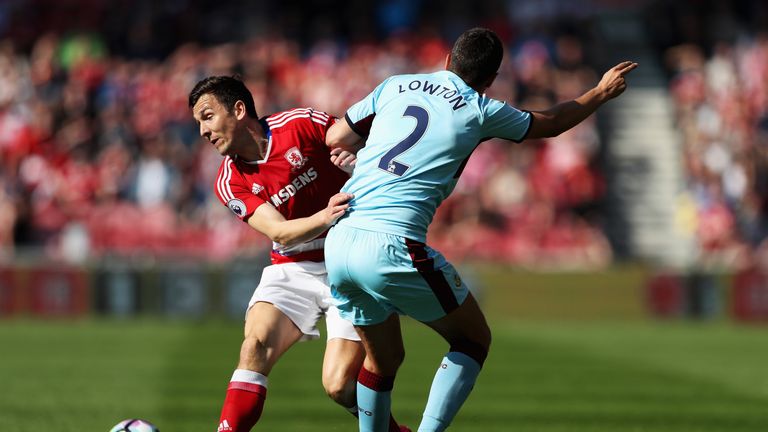 MIDDLESBROUGH, ENGLAND - APRIL 08: Stewart Downing of Middlesbrough (L) and Matthew Lowton of Burnley (R) battle for possession during the Premier League m
