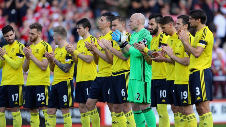 BOURNEMOUTH, ENGLAND - APRIL 22:  Middlesborugh players stand for a minutes applause prior to the Premier League match between AFC Bournemouth and Middlesb