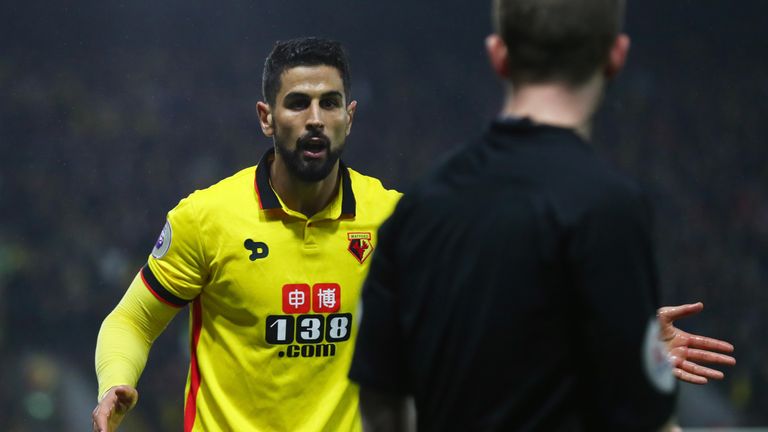 WATFORD, ENGLAND - APRIL 04:  Miguel Britos of Watford (L) pleads his innocence during the Premier League match between Watford and West Bromwich Albion at