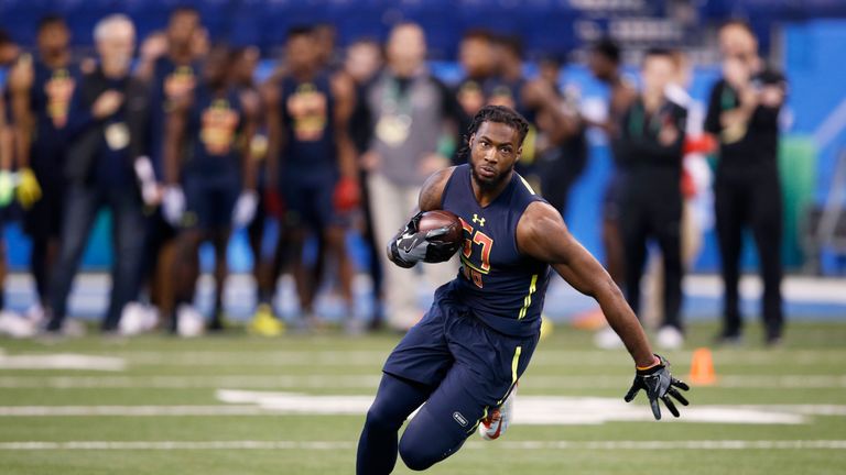INDIANAPOLIS, IN - MARCH 04: Wide receiver Mike Williams of Clemson runs after catching a pass during day four of the NFL Combine at Lucas Oil Stadium on M