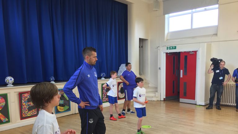 Schneiderlin looks on during an Everton Primary Stars event