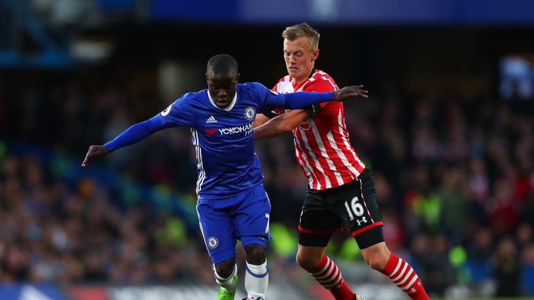LONDON, ENGLAND - APRIL 25:  N'Golo Kante of Chelsea holds off James Ward-Prowse of Southampton during the Premier League match between Chelsea and Southam