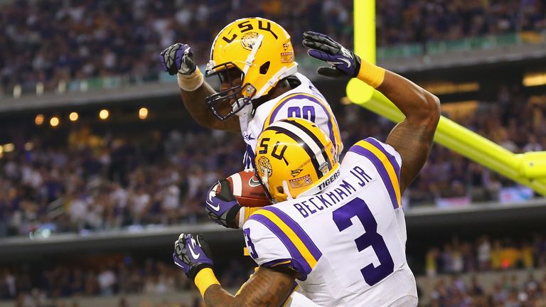 ARLINGTON, TX - AUGUST 31:  Jarvis Landry #80 of the LSU Tigers celebrates his touchdown with Odell Beckham Jr. #3 against the TCU Horned Frogs at AT&T Sta