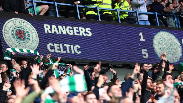 GLASGOW, SCOTLAND - APRIL 29: Celtic fans celebrate infront of the scoreboard during the Ladbrokes Scottish Premiership match between Rangers and Celtic at