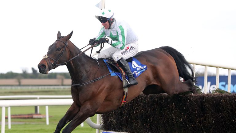 Our Juke Ridden by Robbie Power jumps the last to win The Irish Grand National  during the Easter Festival at Fairyhouse Racecourse, Co. Meath, Ireland. PR